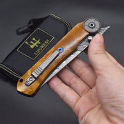 Load image into Gallery viewer, VG10 Damascus Steel Camphor Wood Handle Folding Knife With Back Clip Outdoor Camping Fishing Portable Tools Collecting Gifts EDC
